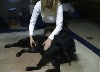 Blond-haired Cougar jerks a dog