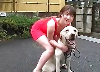 Chinese chick teasing her sexy dog