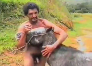 Curly-haired Latino zoophile about to fuck beast