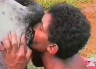 Curly-haired Latino zoophile about to fuck beast